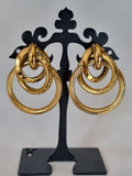 Boucles d’Oreilles Anneaux Dorés Entrelacés