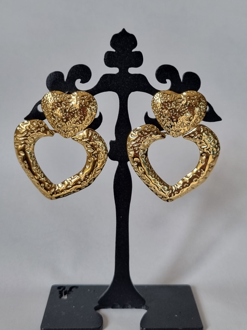 Boucles d’Oreilles Cœurs Dorés Entrelacés