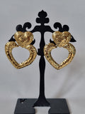 Boucles d’Oreilles Cœurs Dorés Entrelacés