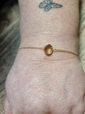 Bracelet doré pierre ambrée