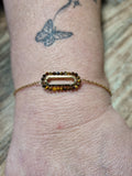 Bracelet doré pierre ambrée
