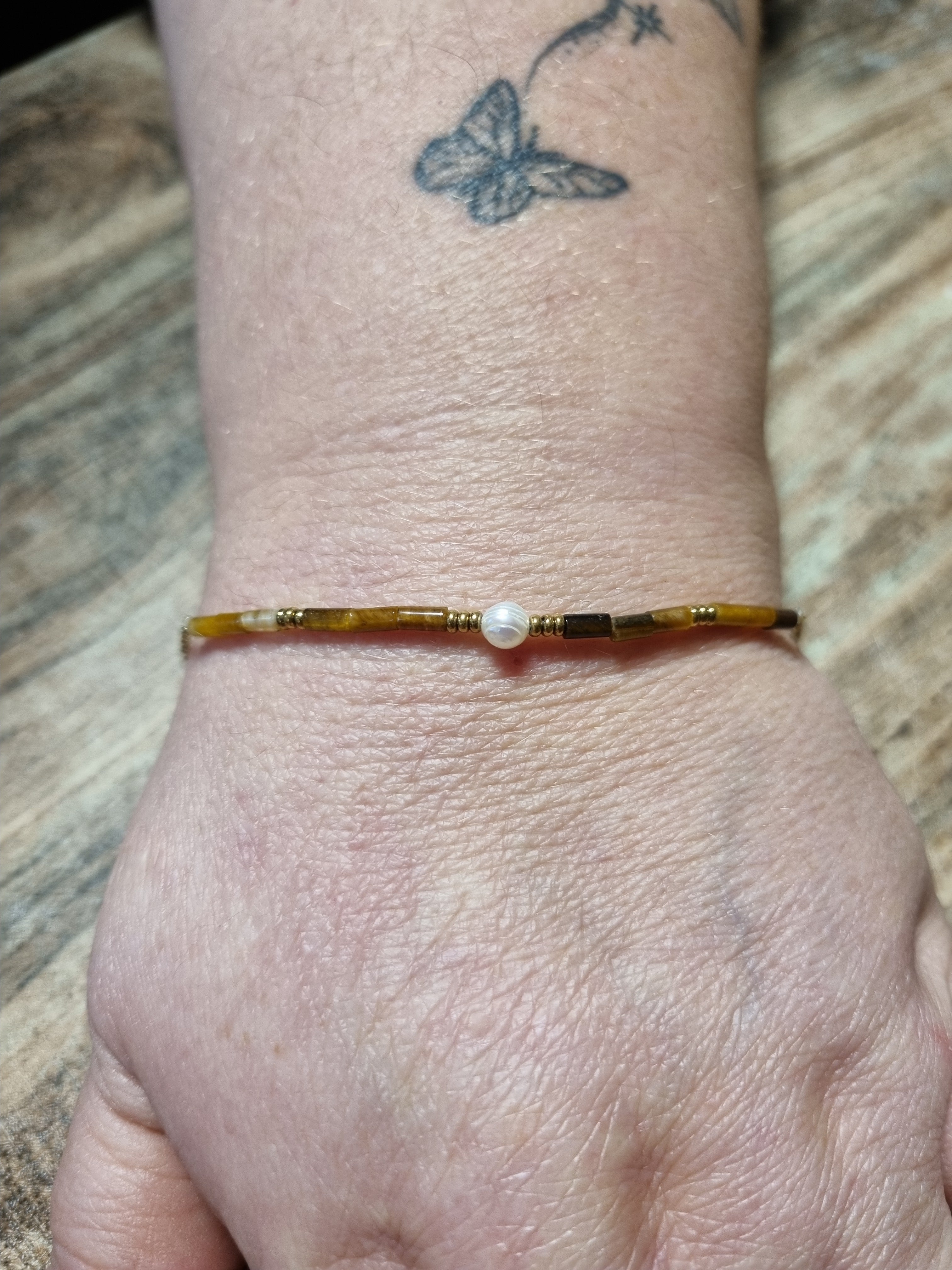 Bracelet doré perle blanche