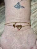 Bracelet doré cœur rayé