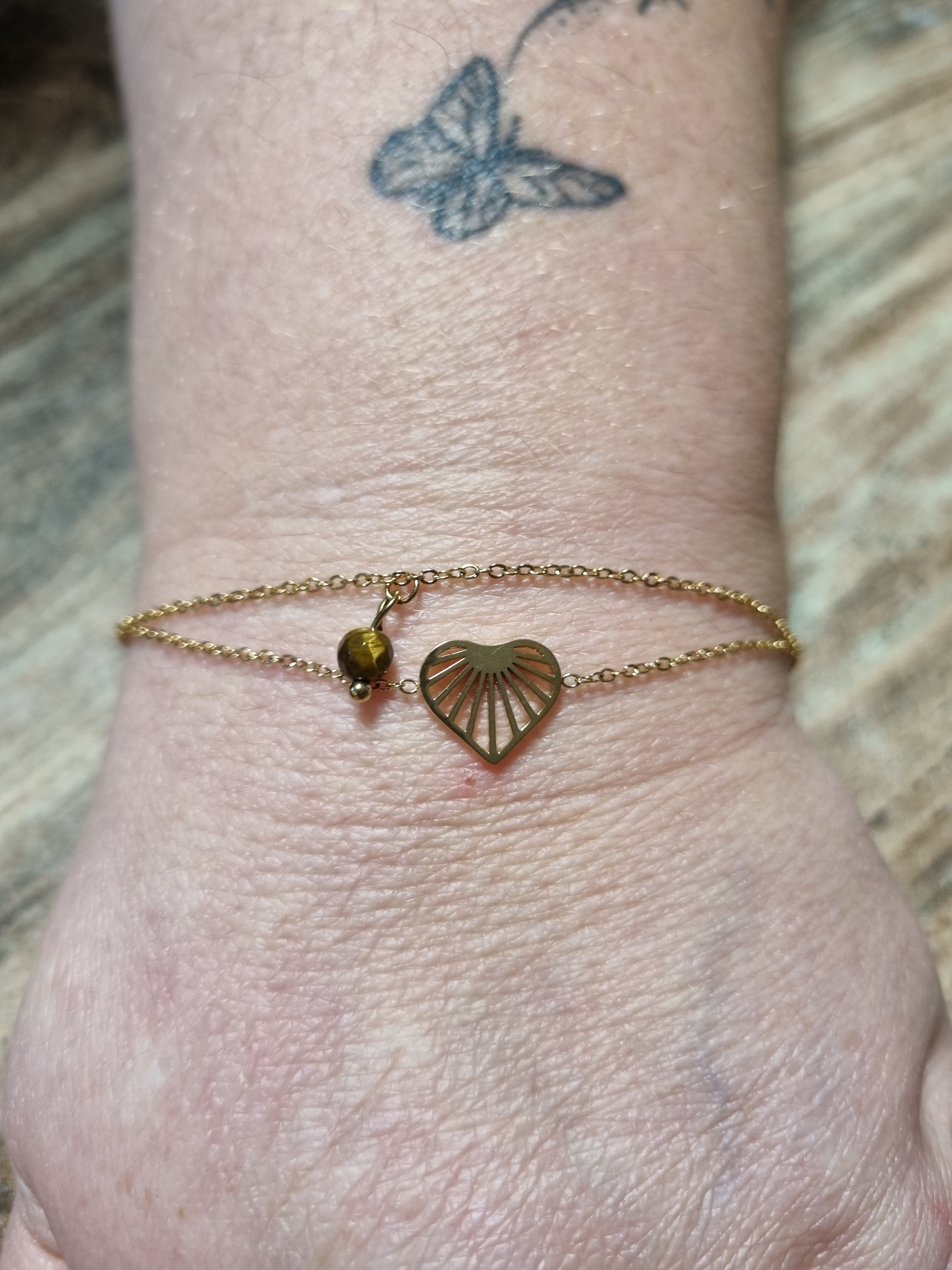 Bracelet doré cœur rayé