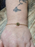 Bracelet doré soleil noir – Minimalisme chic et magnétique