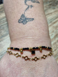 Bracelet trèfle noir doré